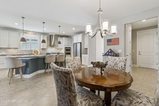 dining area with baseboards, light tile patterned flooring, a chandelier, and recessed lighting