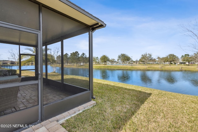 exterior space with a water view