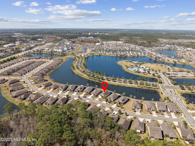 aerial view with a water view and a residential view