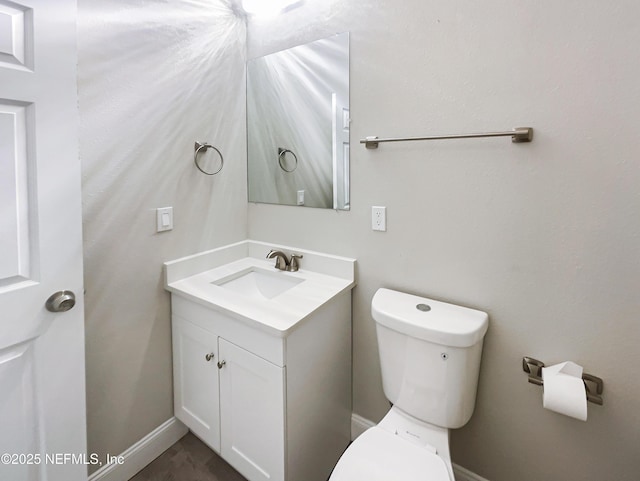 8954 5th Ave, Jacksonville, FL 32208 - bathroom with vanity, toilet, and baseboards