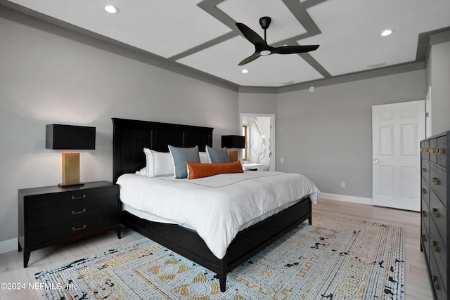 bedroom with recessed lighting, light wood-style flooring, and baseboards