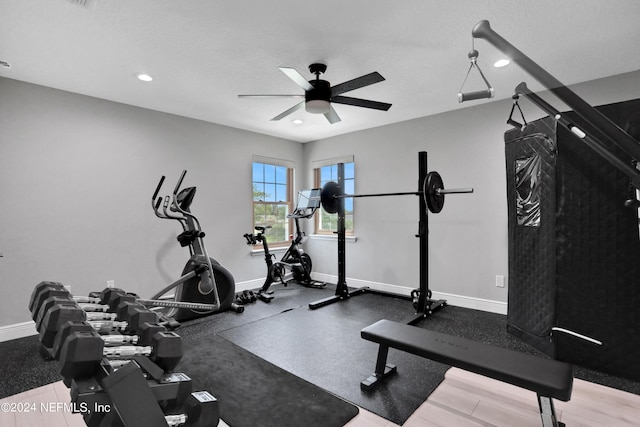 workout room featuring ceiling fan, a textured ceiling, recessed lighting, and baseboards