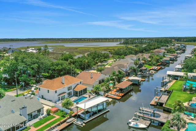 aerial view with a water view and a residential view