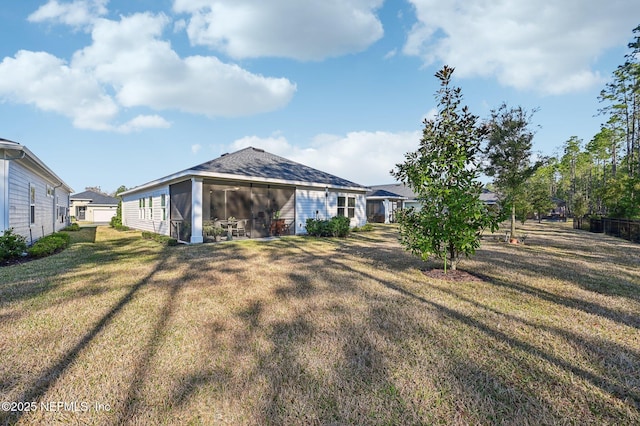 exterior space with a yard and a sunroom