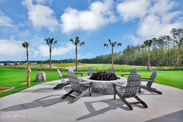 view of patio with an outdoor fire pit