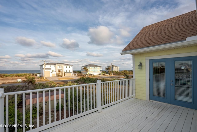 wooden deck featuring french doors