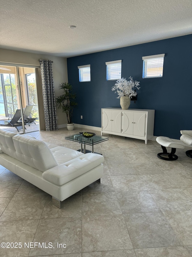 503 Mangrove Thicket Blvd, Ponte Vedra, FL 32081 - living area with a textured ceiling and baseboards