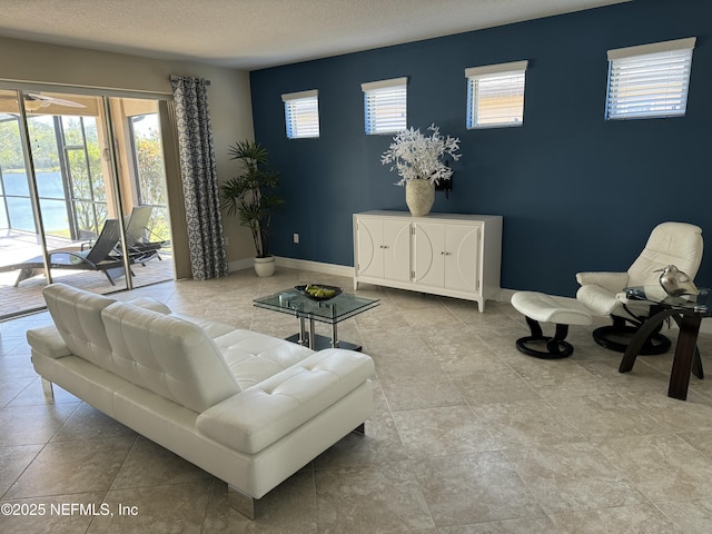 503 Mangrove Thicket Blvd, Ponte Vedra, FL 32081 - living area featuring baseboards and a textured ceiling