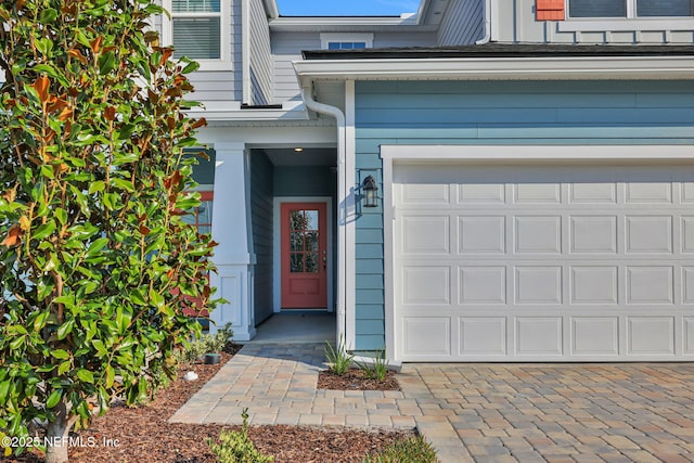 property entrance with a garage