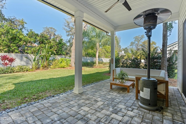 view of patio / terrace with ceiling fan and a fenced backyard