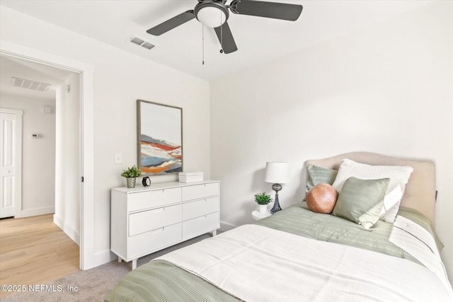 bedroom with visible vents, ceiling fan, and baseboards