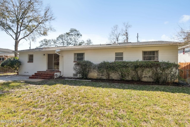 single story home featuring crawl space, fence, and a front lawn