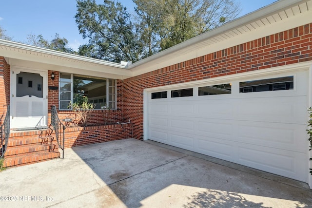 exterior space with concrete driveway