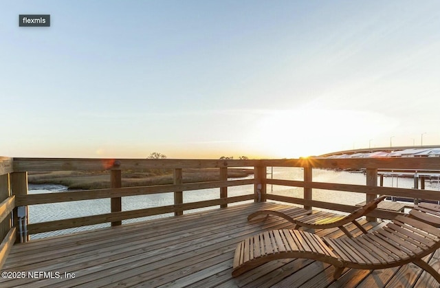 view of dock with a wooden deck