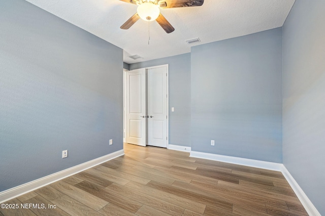 427 Ladyslipper Dr, Saint Johns, FL 32259 - empty room with baseboards, ceiling fan, visible vents, and light wood finished floors