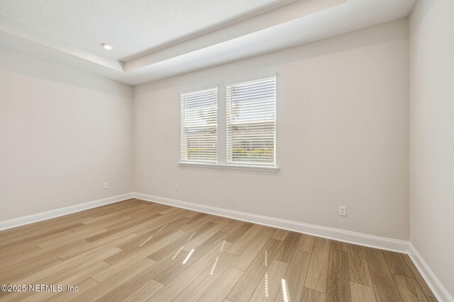 427 Ladyslipper Dr, Saint Johns, FL 32259 - empty room with baseboards, light wood-style floors, and recessed lighting
