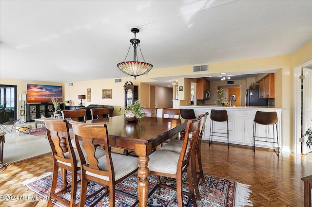 dining space with visible vents