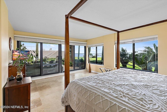 bedroom featuring a textured ceiling