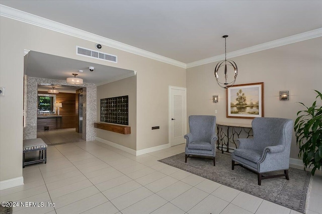 living area with baseboards, light tile patterned flooring, visible vents, and crown molding