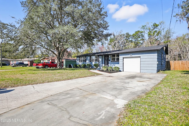 ranch-style home featuring a garage, concrete driveway, a front yard, and fence