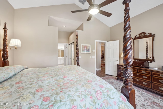 bedroom with visible vents, ceiling fan, ensuite bath, vaulted ceiling, and a closet