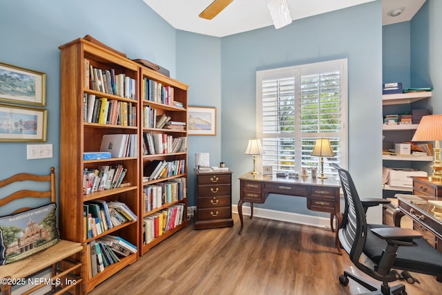 office area featuring ceiling fan, baseboards, and wood finished floors