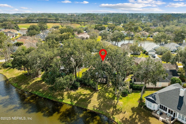 aerial view with a residential view and a water view