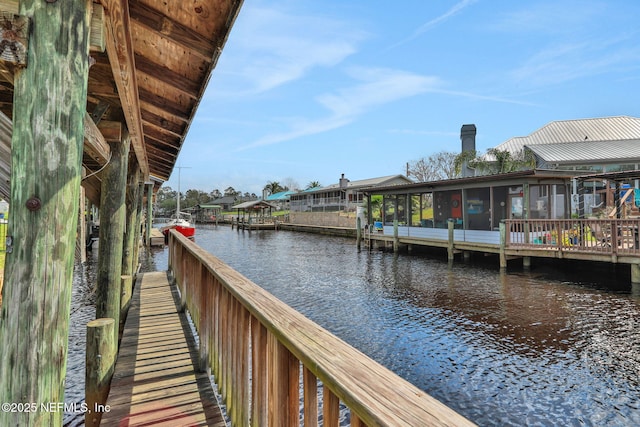 dock area with a water view