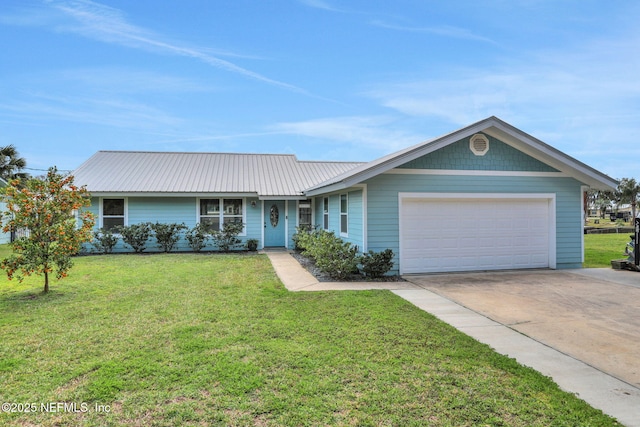 ranch-style home featuring driveway, an attached garage, metal roof, and a front yard