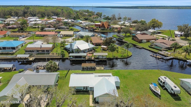 aerial view featuring a water view and a residential view