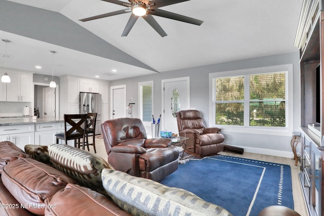 living room featuring recessed lighting, vaulted ceiling, baseboards, and ceiling fan