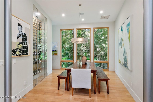 2446 Seminole Rd, Atlantic Beach, FL 32233 - dining room featuring baseboards, visible vents, wood finished floors, and recessed lighting