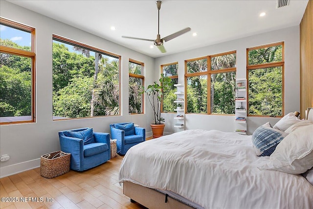2446 Seminole Rd, Atlantic Beach, FL 32233 - bedroom featuring light wood-style flooring, multiple windows, and visible vents