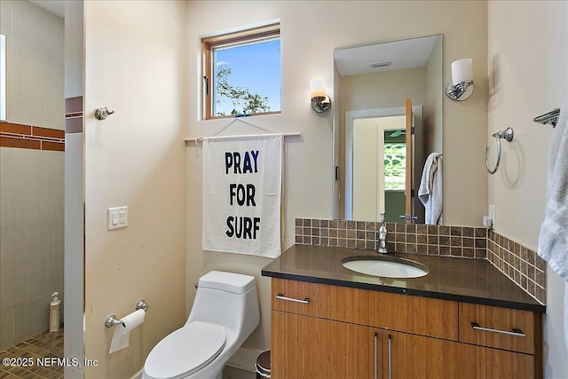 2446 Seminole Rd, Atlantic Beach, FL 32233 - bathroom featuring toilet, visible vents, vanity, and a wealth of natural light