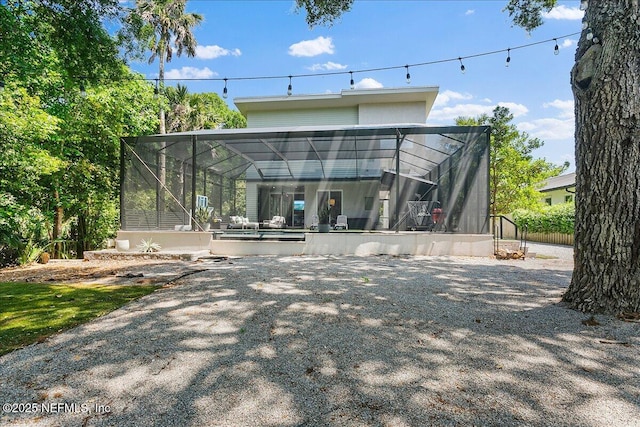 2446 Seminole Rd, Atlantic Beach, FL 32233 - rear view of property featuring glass enclosure