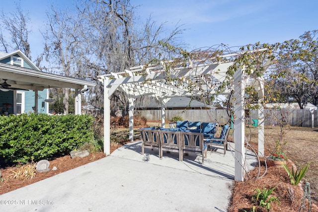 view of patio featuring fence and a pergola