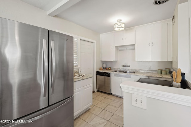 kitchen featuring a sink, white cabinets, light tile patterned floors, and stainless steel appliances