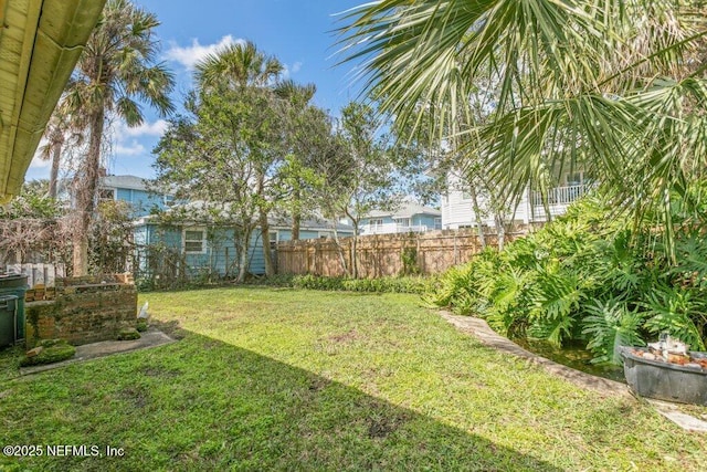 view of yard featuring fence