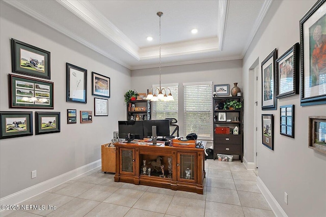 office area with light tile patterned floors, baseboards, ornamental molding, an inviting chandelier, and a tray ceiling