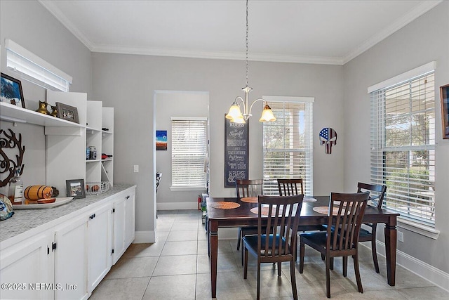 dining room featuring ornamental molding, a healthy amount of sunlight, baseboards, and light tile patterned floors