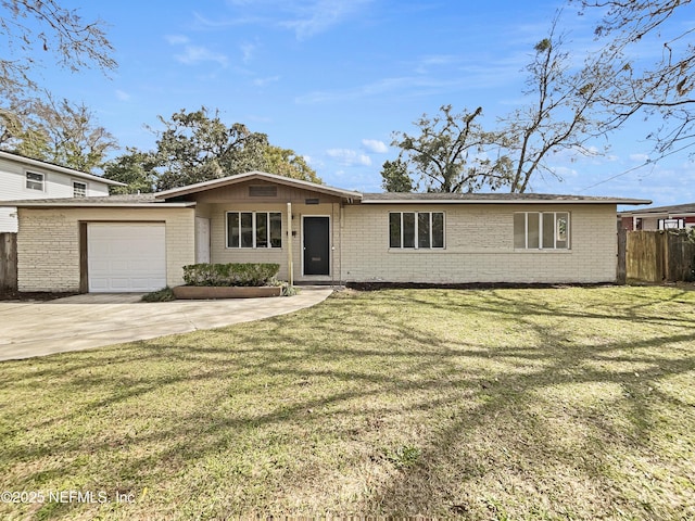 view of front of property with a front lawn, brick siding, and an attached garage