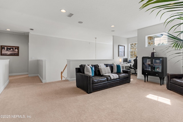 living room with visible vents, carpet flooring, and recessed lighting