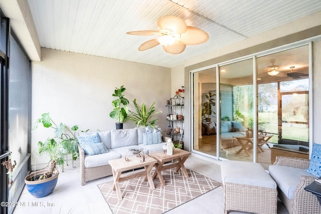 sunroom / solarium with wooden ceiling and ceiling fan