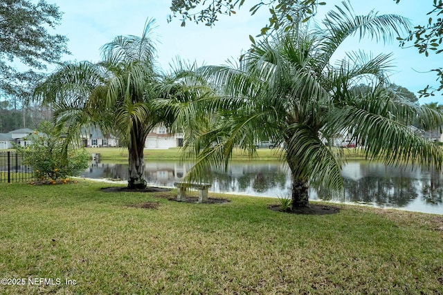 view of water feature with fence