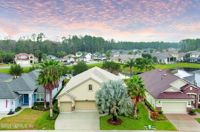 aerial view at dusk with a residential view