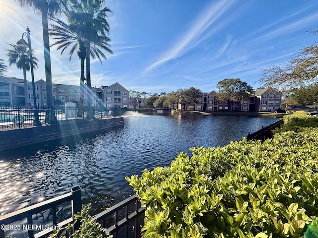 property view of water with fence