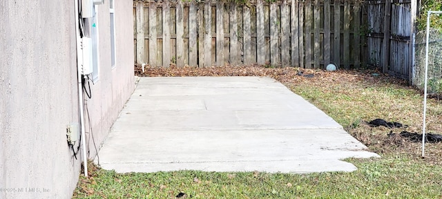 view of patio with fence