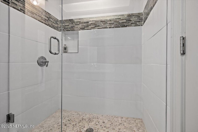 bathroom featuring a stall shower