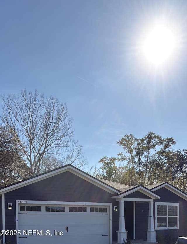 view of front of home with a garage