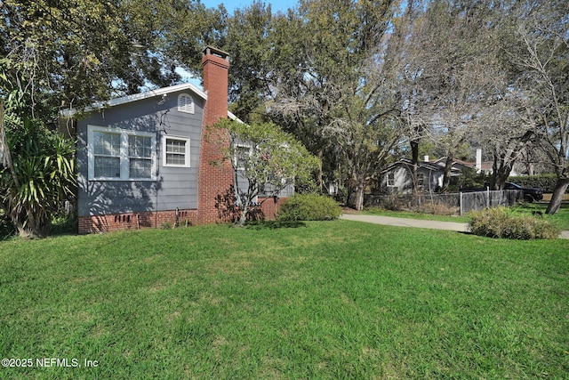 view of yard featuring fence